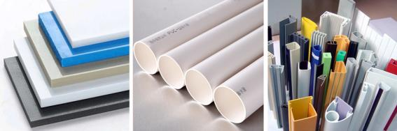 Plastic sheets, pipes, and profiles ready for crushing.