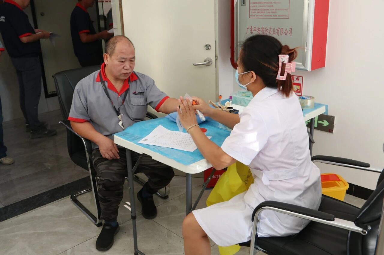 XIECHENG employees participating in workplace health screenings